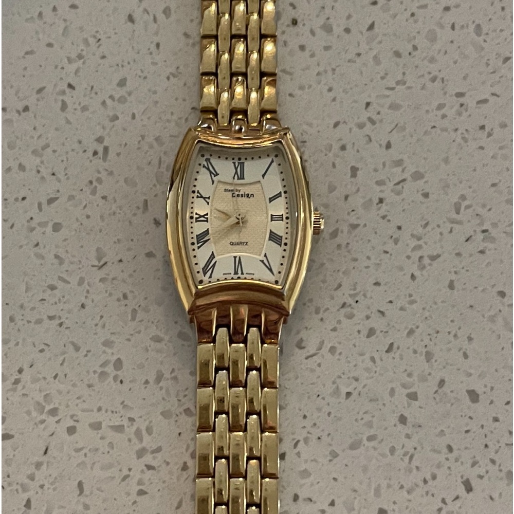 COPY - Ladies Steel by Design Gold Tone Rectangle
Stainless Steel Analog Quartz…